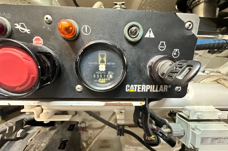 Loca Louise Yacht Photos Pics Control panel of a 2002 Hatteras 50 Convertible Sportfish with Caterpillar engine.
