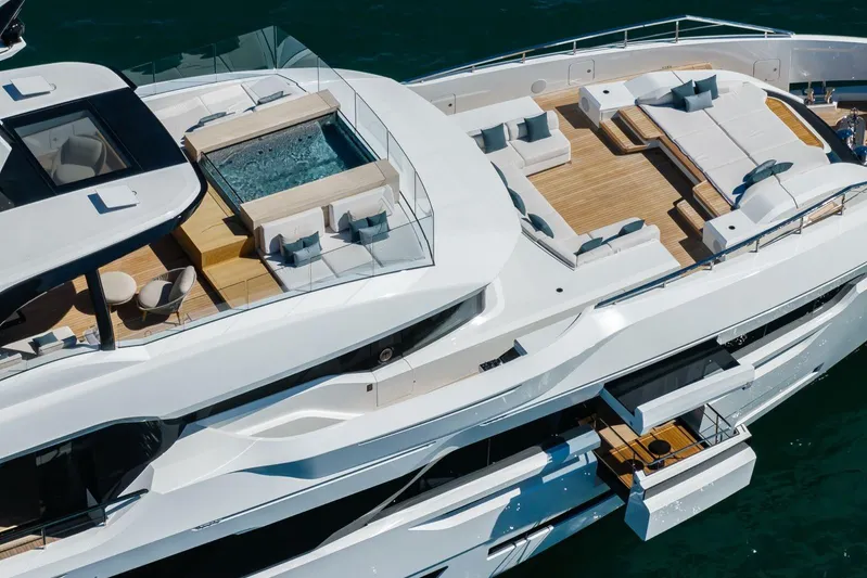  Yacht Photos Pics Luxury Baglietto DOM 133 yacht, 2025 model, featuring spacious deck and jacuzzi.