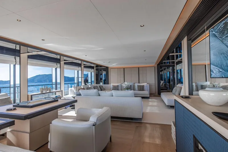  Yacht Photos Pics Luxurious interior of 2025 Baglietto DOM 133 yacht with modern furnishings and ocean view.