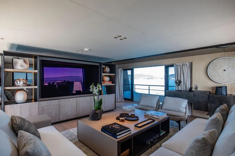  Yacht Photos Pics Luxurious interior of 2025 Baglietto DOM 133 yacht with modern decor and ocean view.