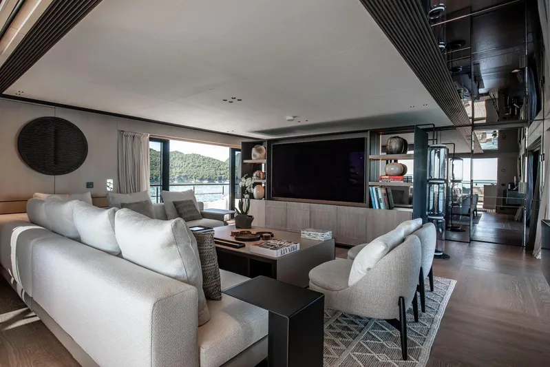  Yacht Photos Pics Luxurious interior of 2025 Baglietto DOM 133 yacht with modern furnishings and large windows.