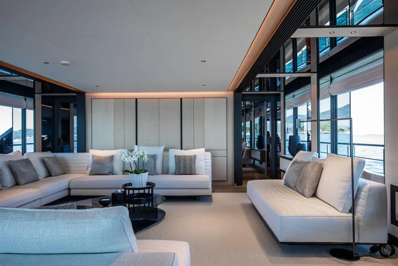  Yacht Photos Pics Luxurious interior of 2025 Baglietto DOM 133 yacht with elegant seating and panoramic windows.
