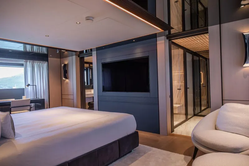  Yacht Photos Pics Luxurious interior of 2025 Baglietto DOM 133 yacht, featuring modern bedroom and elegant design.