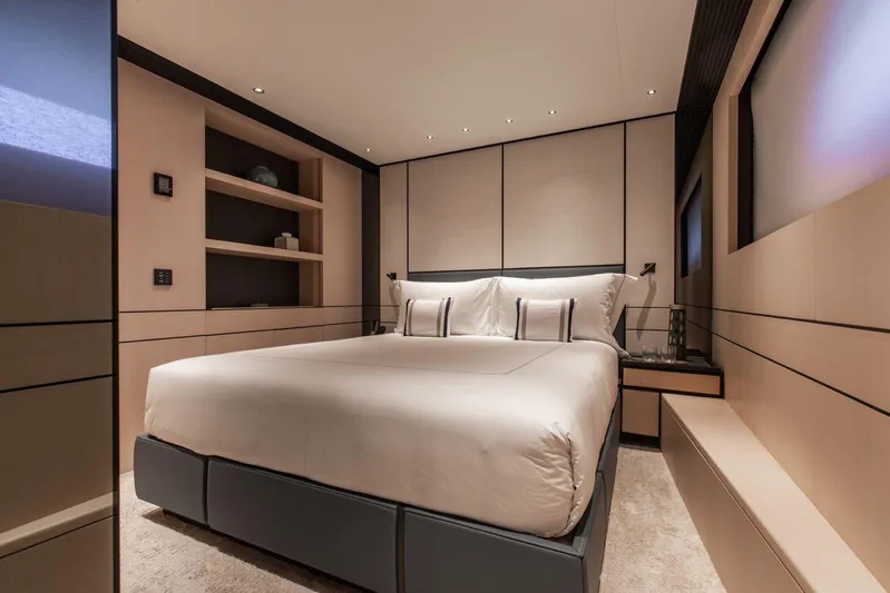  Yacht Photos Pics Luxurious bedroom interior of 2025 Baglietto DOM 133 yacht, featuring modern design and elegant furnishings.