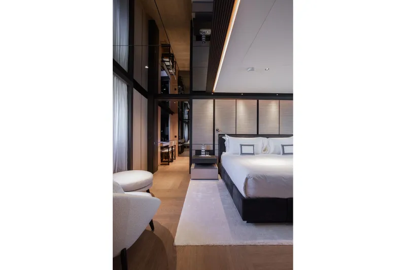  Yacht Photos Pics Luxurious bedroom interior on Baglietto DOM 133 yacht, 2025 model, featuring modern design elements.