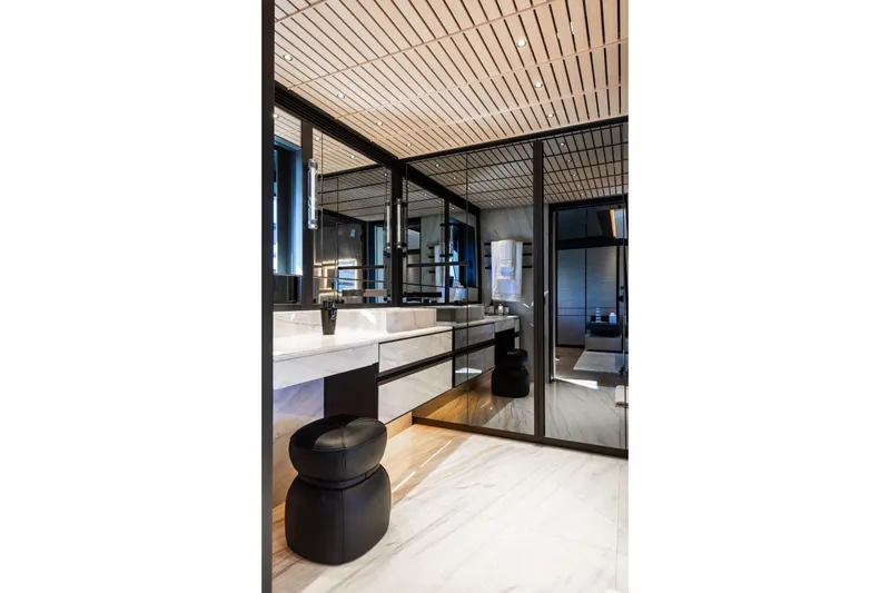  Yacht Photos Pics Luxurious modern bathroom interior on Baglietto DOM 133 yacht, 2025 model, featuring sleek design elements.