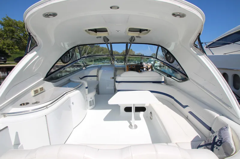  Yacht Photos Pics 2012 Formula 400 Super Sport boat interior with white seating and table.
