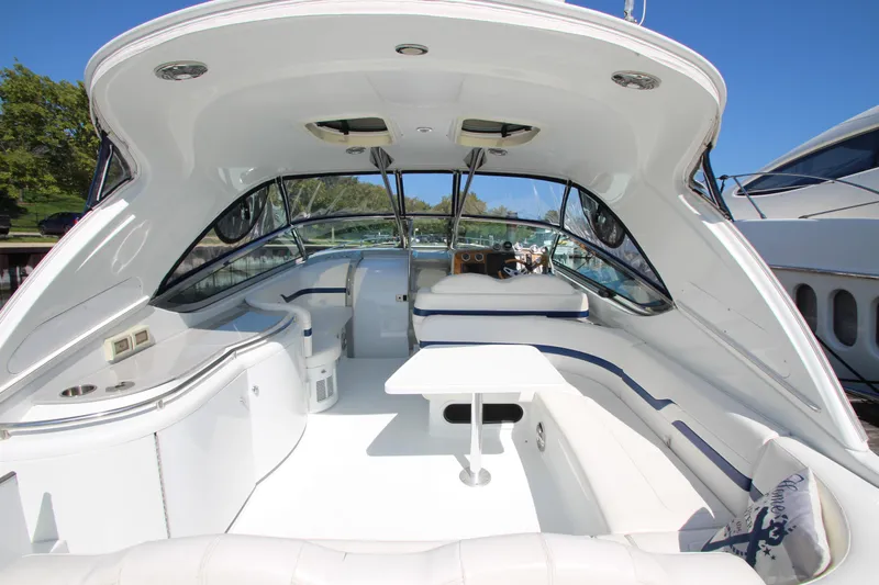  Yacht Photos Pics 2012 Formula 400 Super Sport boat interior with white seating and table.