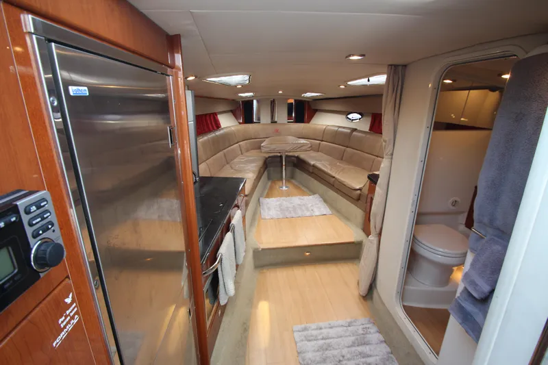  Yacht Photos Pics Interior of 2012 Formula 400 Super Sport yacht with seating area and kitchenette.