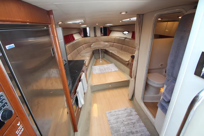  Yacht Photos Pics Interior of 2012 Formula 400 Super Sport yacht with kitchen, seating area, and bathroom.