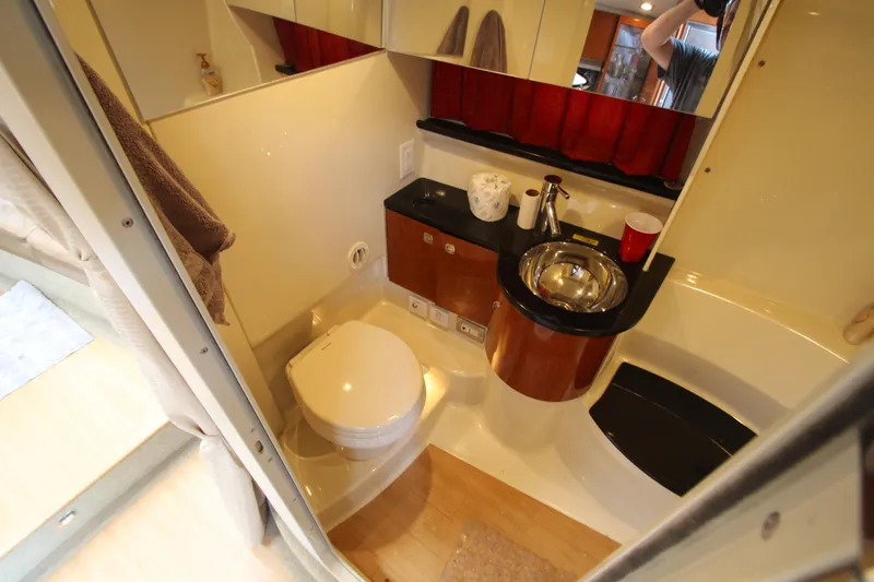  Yacht Photos Pics 2012 Formula 400 Super Sport yacht bathroom with toilet, sink, and shower.