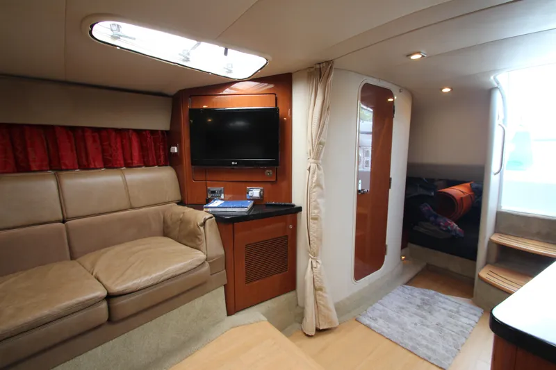  Yacht Photos Pics Interior of a 2012 Formula 400 Super Sport yacht with leather seating and TV.