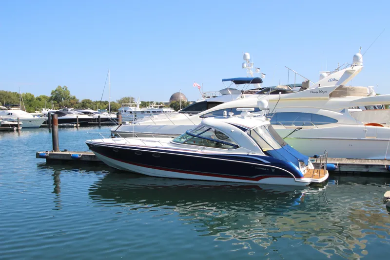  Yacht Photos Pics 2012 Formula 400 Super Sport yacht docked in a marina.