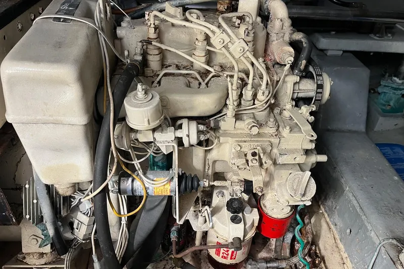  Yacht Photos Pics Engine of 1990 Mikelson 48 Sportfisher boat, detailed view with components and wiring.