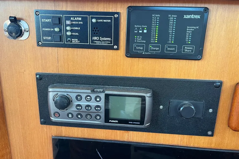  Yacht Photos Pics Control panel of a 1990 Mikelson 48 Sportfisher with electronic displays and controls.