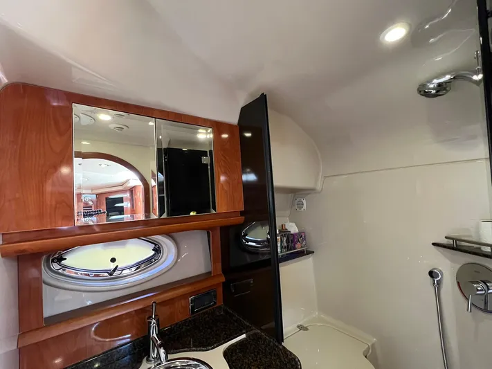 2006 Four Winns 348 Vista Yacht Photos Pics Luxurious bathroom interior of 2006 Four Winns 348 Vista yacht with modern fixtures.