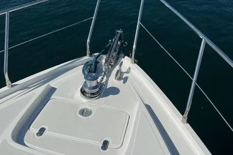  Yacht Photos Pics Bow of 2011 Pershing 50.1 yacht with anchor and railing.