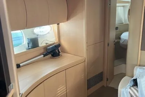  Yacht Photos Pics Interior of 2011 Pershing 50.1 yacht, featuring sleek cabinetry and modern design.