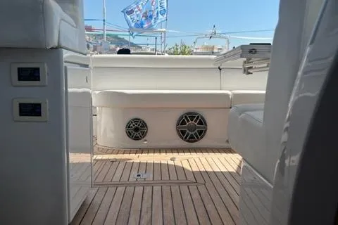  Yacht Photos Pics 2011 Pershing 50.1 yacht interior with wooden deck and modern seating.