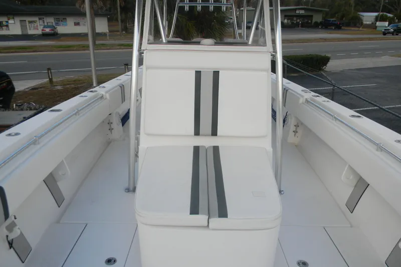  Yacht Photos Pics 2022 Contender 39 ST boat interior with white seating and sleek design.