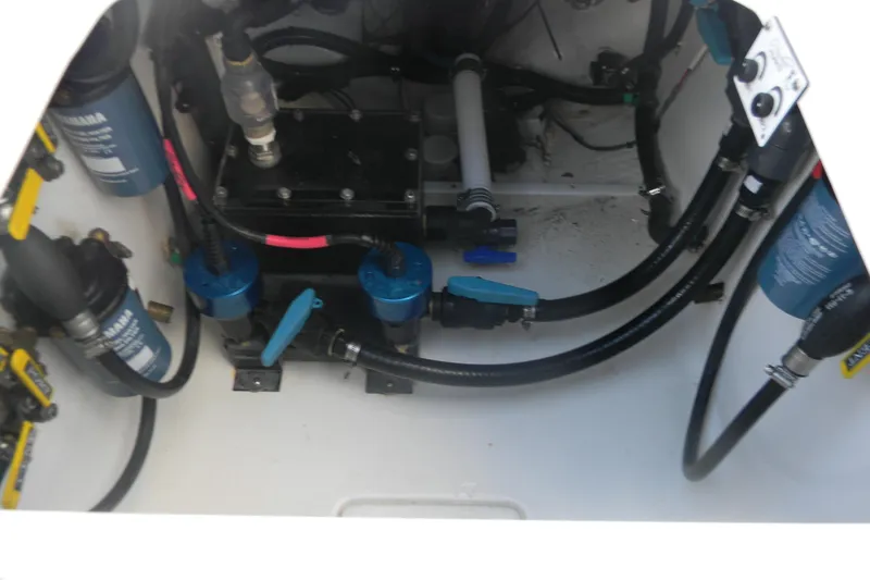  Yacht Photos Pics 2022 Contender 39 ST engine compartment with Yamaha filters and hoses.