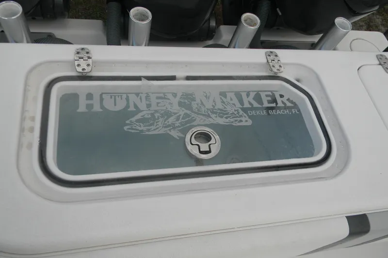  Yacht Photos Pics 2022 Contender 39 ST boat hatch with "HONEY MAKER" logo, Dekle Beach, FL.