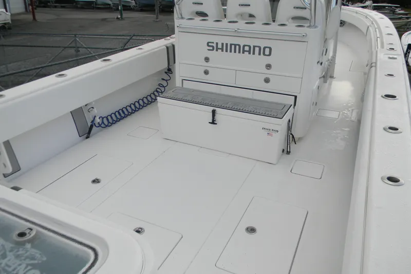  Yacht Photos Pics 2022 Contender 39 ST boat deck with Shimano storage and seating.