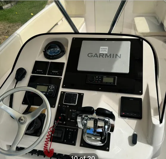  Yacht Photos Pics 2001 Intrepid 327 Center Console dashboard with Garmin navigation system and controls.