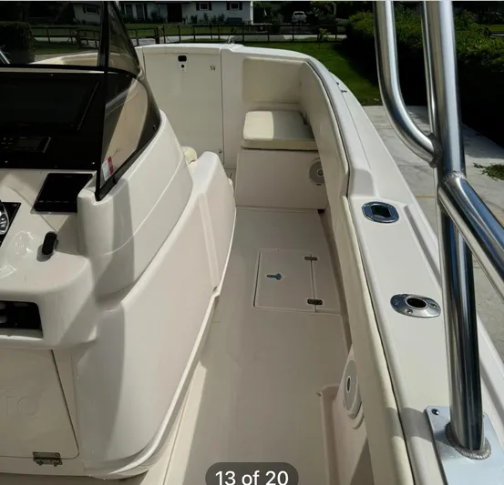  Yacht Photos Pics 2001 Intrepid 327 Center Console boat interior with seating and console view.