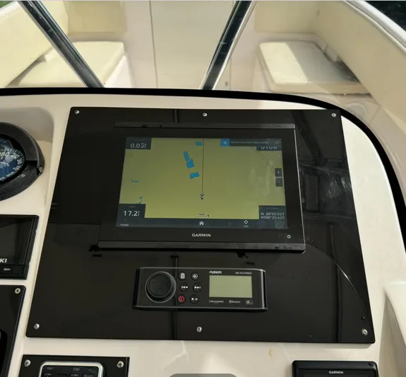  Yacht Photos Pics 2001 Intrepid 327 Center Console dashboard with Garmin navigation display.