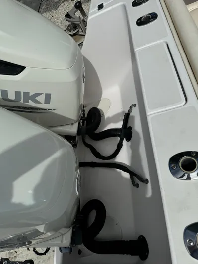  Yacht Photos Pics 2001 Intrepid 327 Center Console with Suzuki outboard engines, showing engine connections.