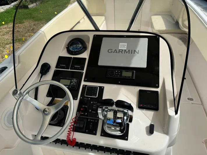  Yacht Photos Pics 2001 Intrepid 327 Center Console boat dashboard with Garmin navigation system.