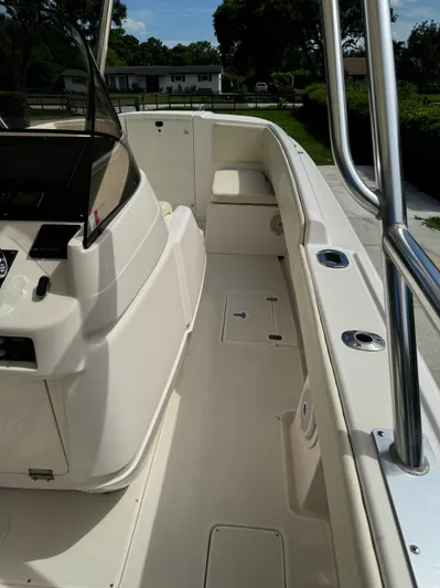  Yacht Photos Pics 2001 Intrepid 327 Center Console boat interior with seating and control panel.