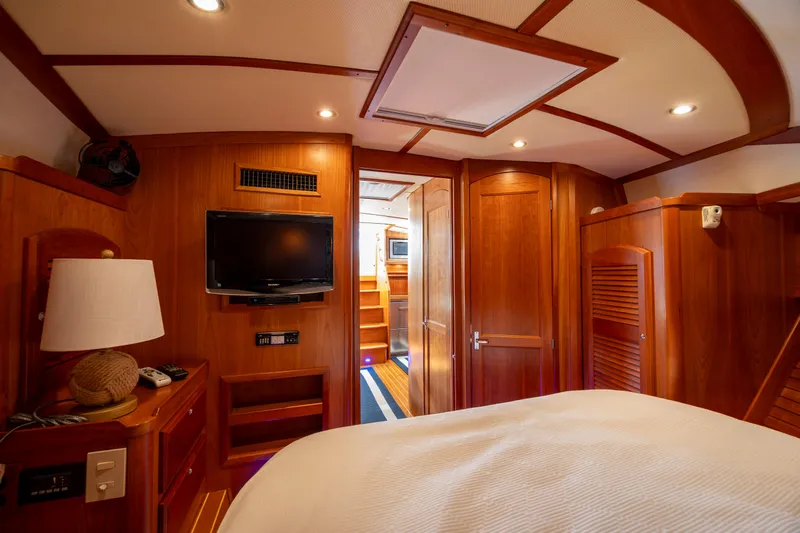  Yacht Photos Pics Luxurious interior of 2009 Sabre 42 Express yacht with wood paneling and modern amenities.