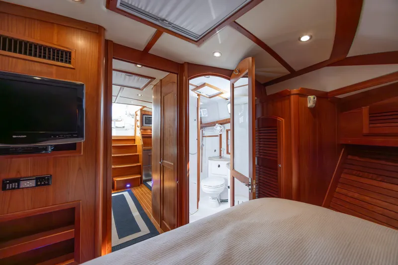  Yacht Photos Pics Luxurious interior of 2009 Sabre 42 Express yacht with wood finish and modern amenities.