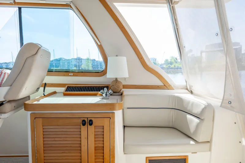  Yacht Photos Pics Interior of 2009 Sabre 42 Express yacht with seating and window view.