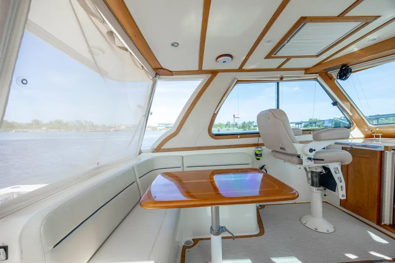  Yacht Photos Pics Interior of 2009 Sabre 42 Express yacht with seating and helm station.