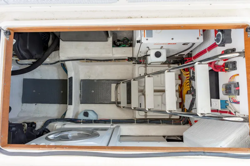  Yacht Photos Pics Engine room of 2009 Sabre 42 Express yacht, featuring equipment and ladder access.