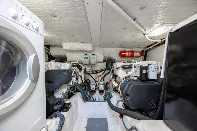  Yacht Photos Pics Engine room of 2009 Sabre 42 Express with washer and fire extinguisher.