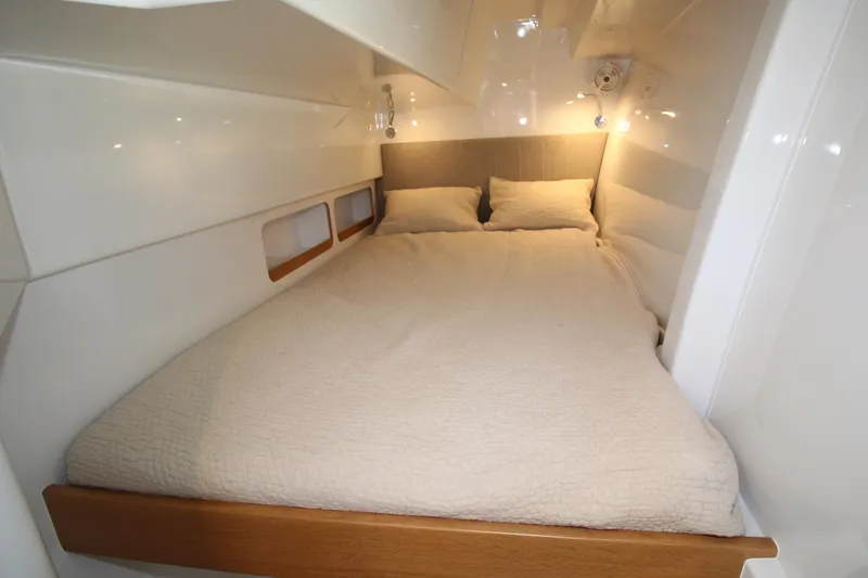 Build To Order Yacht Photos Pics Cozy cabin interior of 2026 Chris White Spindrift 47 yacht with double bed.