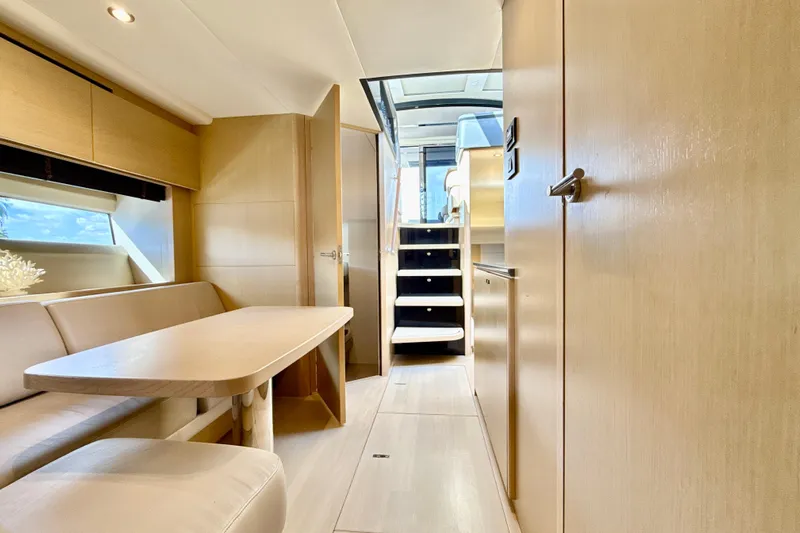 Il Capo Yacht Photos Pics Luxurious interior of 2017 Princess V58 yacht with modern furnishings and elegant design.