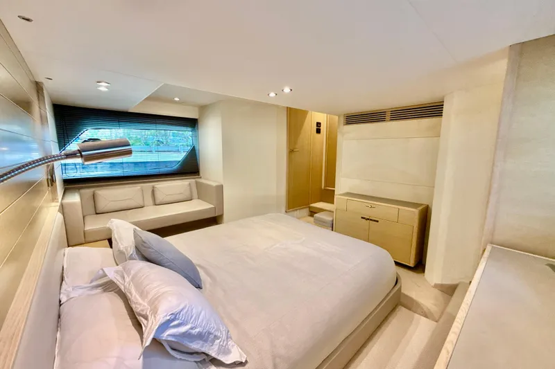 Il Capo Yacht Photos Pics Luxurious 2017 Princess V58 yacht bedroom with modern decor and elegant furnishings.
