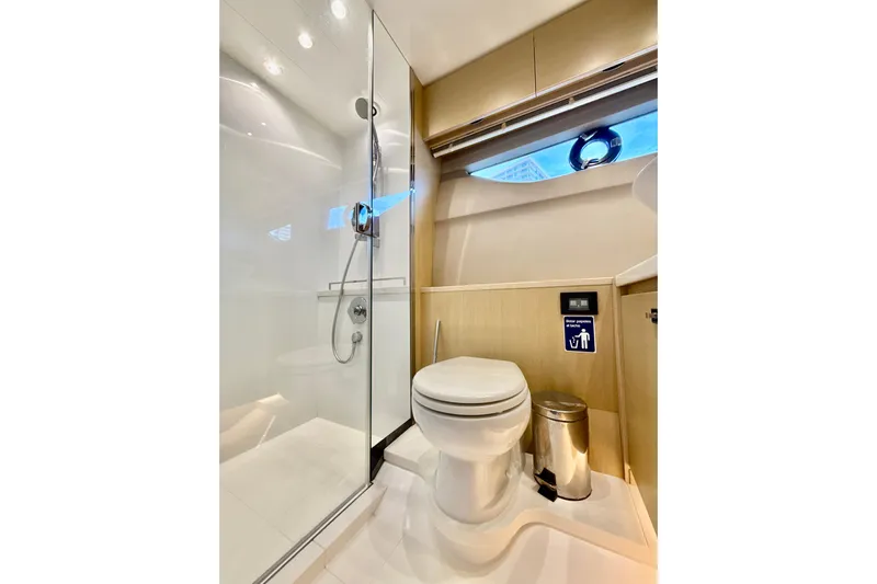 Il Capo Yacht Photos Pics Luxurious bathroom in 2017 Princess V58 yacht with modern shower and toilet.