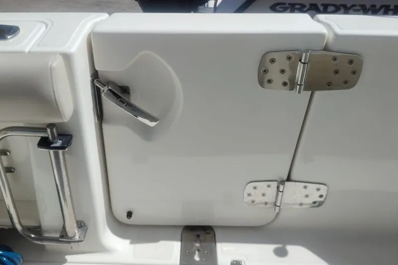  Yacht Photos Pics 2024 Boston Whaler 280 Outrage boat door with stainless steel hinges and handle.