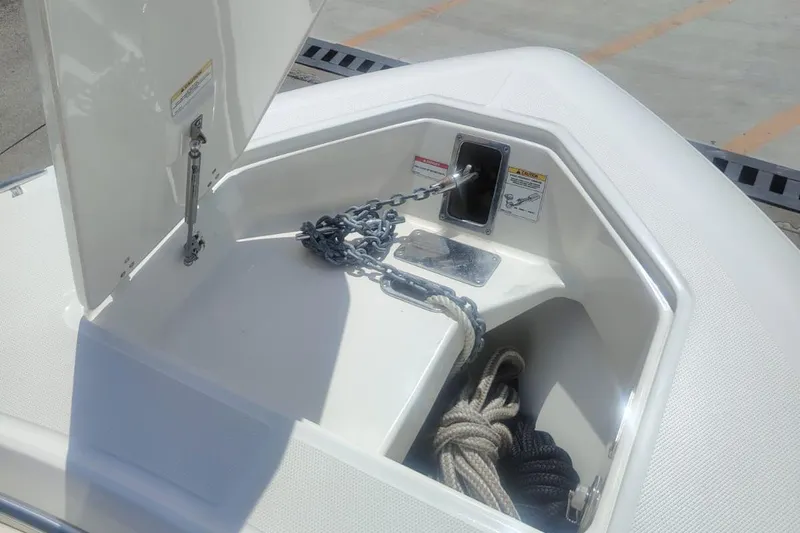  Yacht Photos Pics 2024 Boston Whaler 280 Outrage anchor storage with chain and rope.