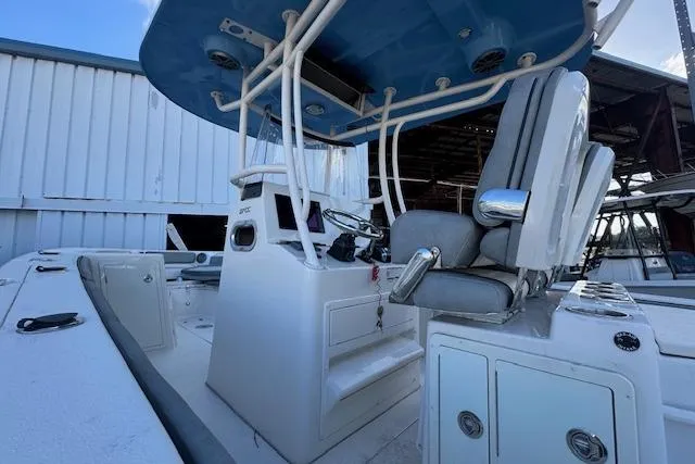  Yacht Photos Pics 2024 Sea Chaser 27 HFC CC boat interior with helm and seating area.
