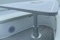 2021 Comitti Isola 33 boat interior with sleek seating and modern table design.