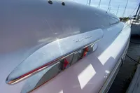 2021 Comitti Isola 33 boat detail with sleek design and chrome accents.