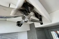 Interior detail of a 2021 Comitti Isola 33 boat, showcasing sleek metal fittings.