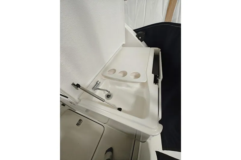 Got Fish Yacht Photos Pics 2005 Tiara Yachts 3200 Open sink area with faucet and cup holders.